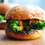 broccoli and gochujang sandwich with mozzarella and garlic chips