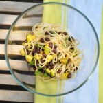 avocado and black beans tossed with noodles