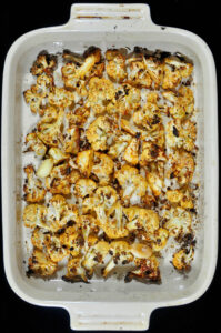 baking dish full of spicy roasted cauliflower