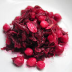 beet and chickpea salad piled on a white plate